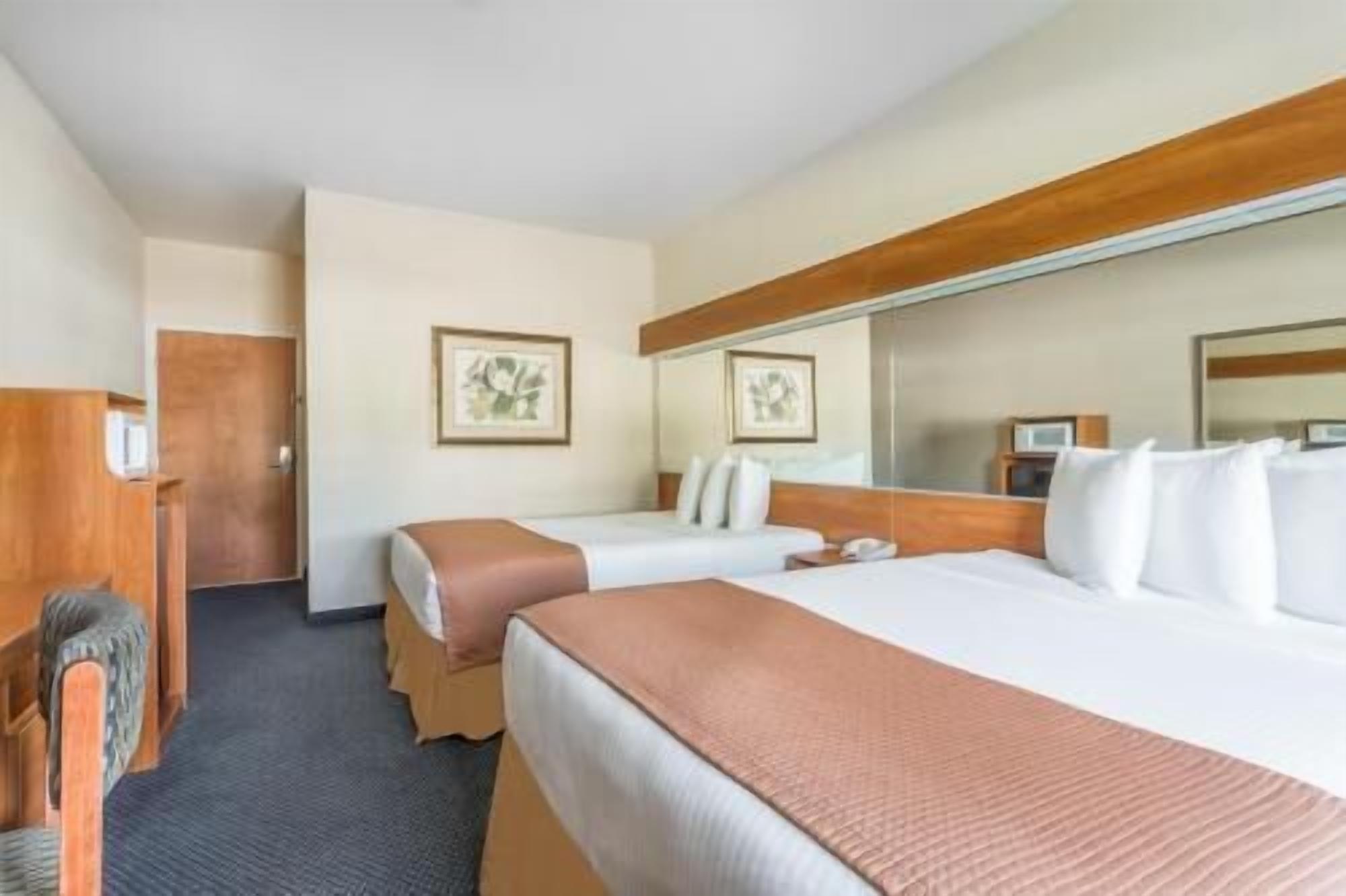 In-room safe, desk, iron/ironing board, free cribs/infant beds