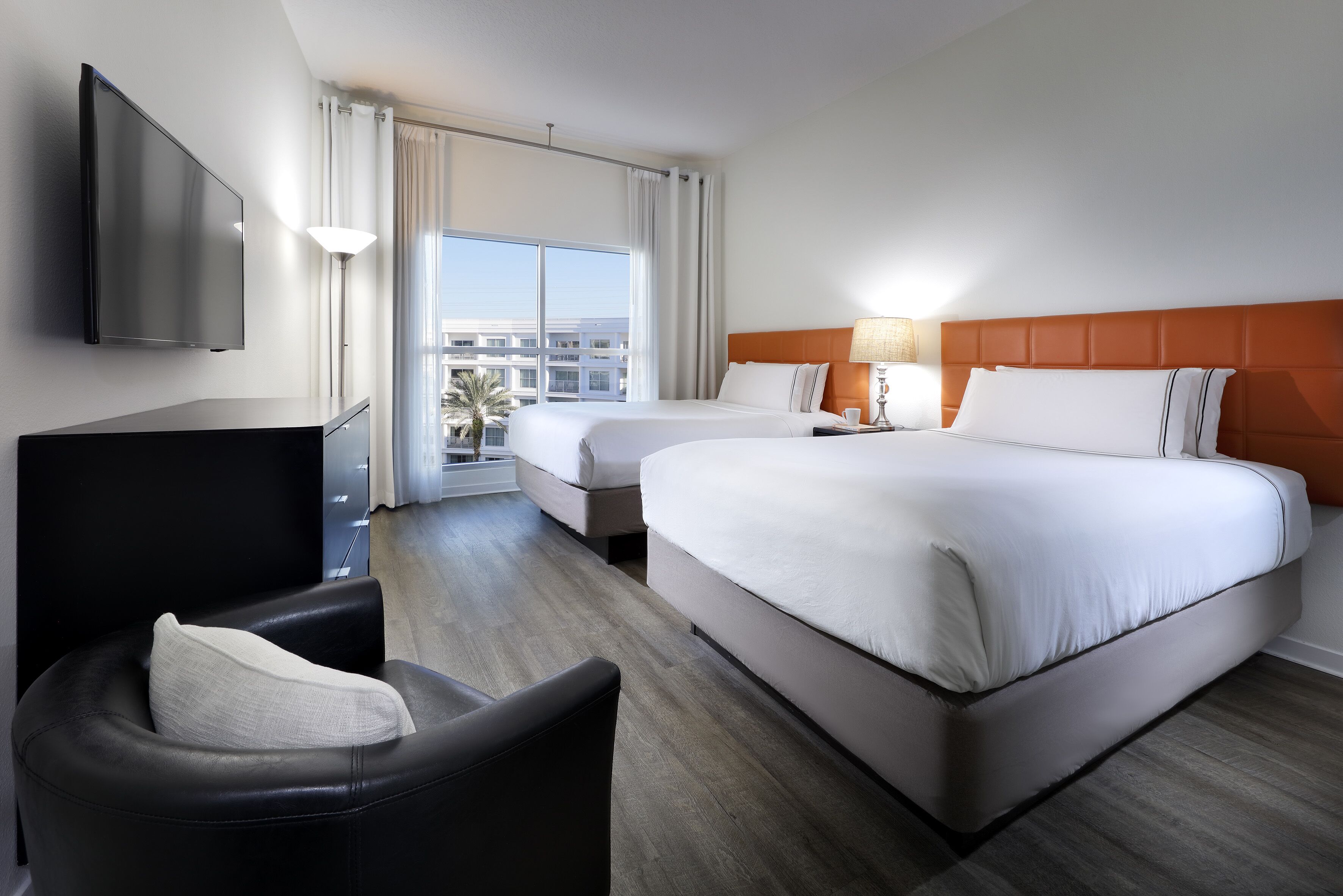 two bedroom, family suite | in-room safe, desk, laptop workspace, blackout curtains