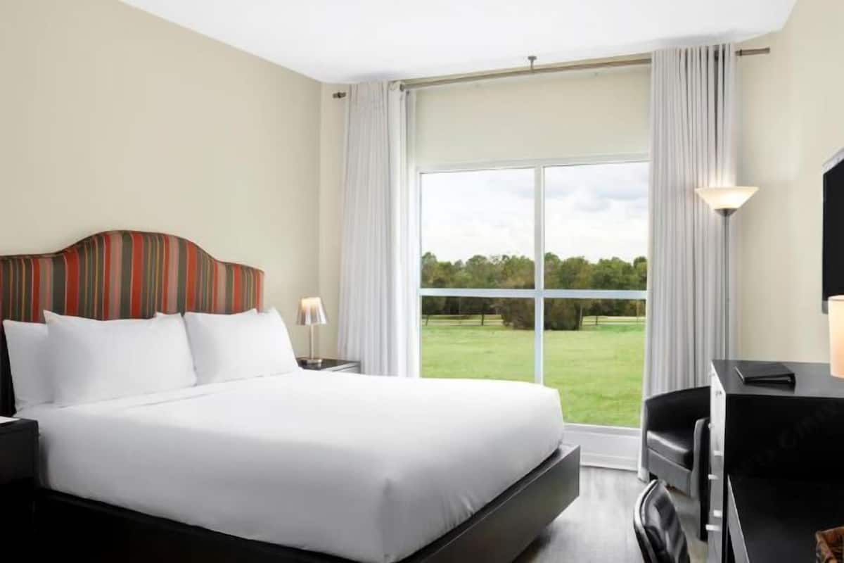 In-room safe, desk, laptop workspace, blackout curtains