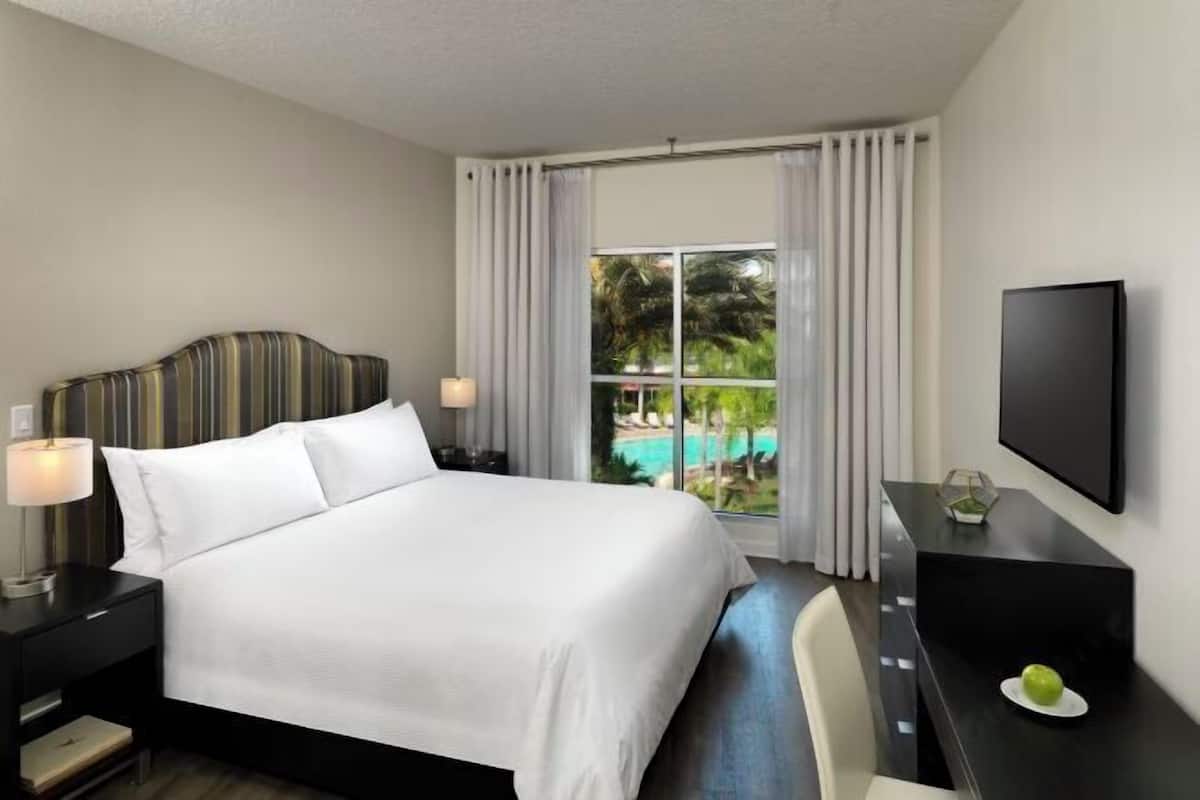 In-room safe, desk, laptop workspace, blackout curtains