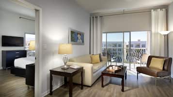 One Bedroom Corner Suite with Terrace | In-room safe, desk, laptop workspace, blackout drapes