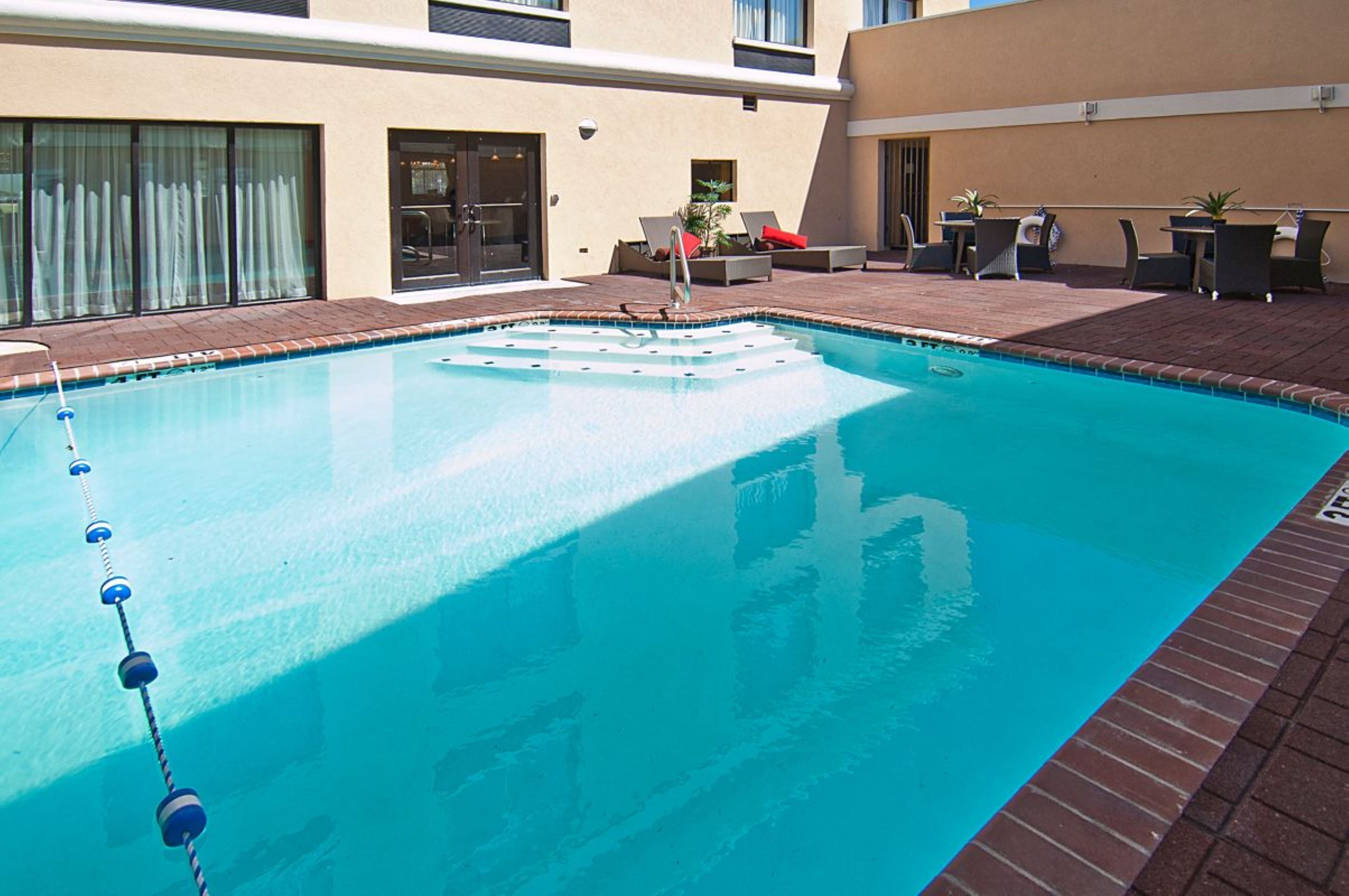 outdoor pool, pool loungers