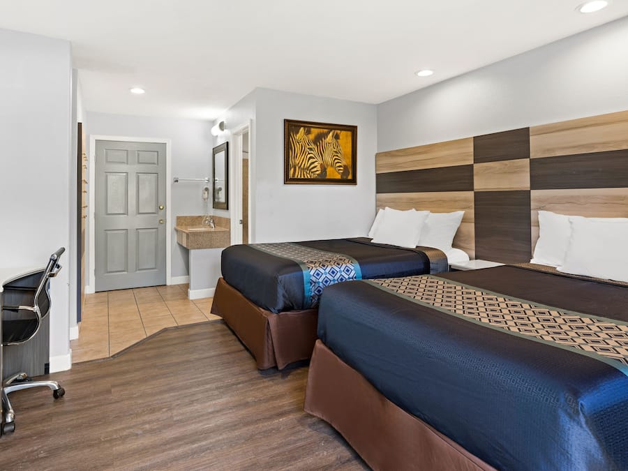 Deluxe Double Room, 2 Double Beds | Desk, iron/ironing board, free WiFi, bed sheets