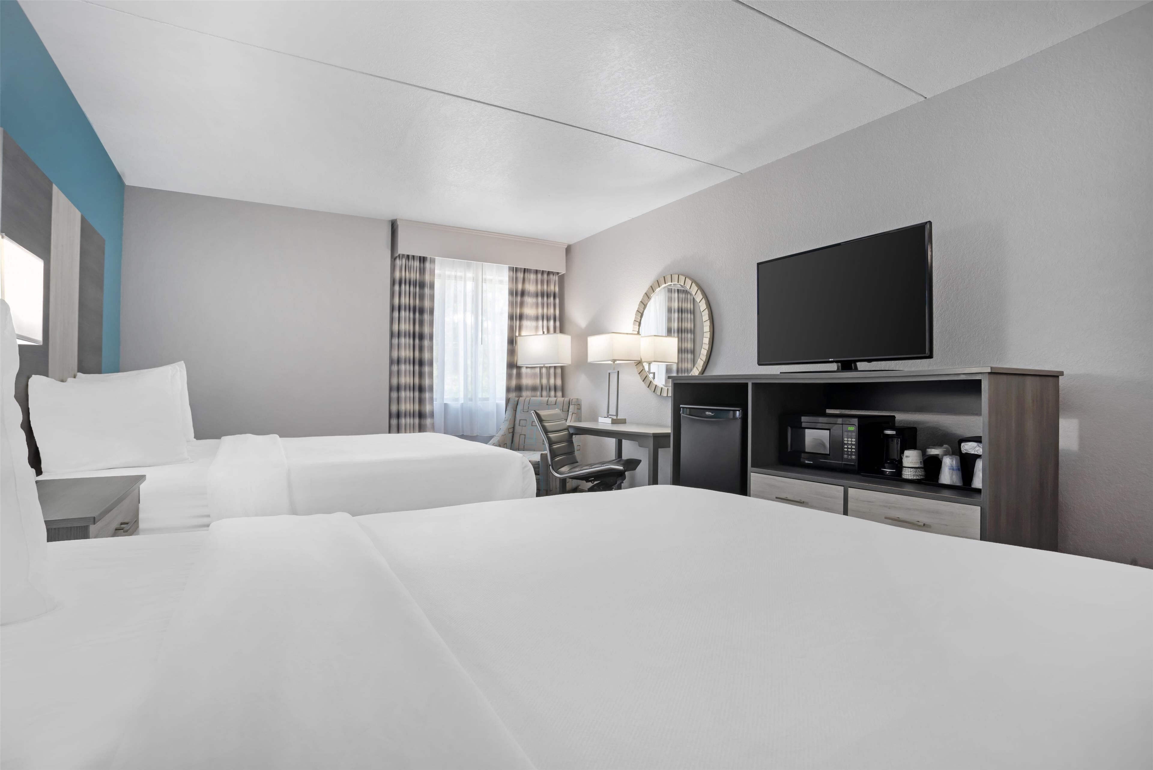 standard room, 2 queen beds, non smoking, refrigerator & microwave (pet friendly) | 1 bedroom, pillow-top beds, individually decorated