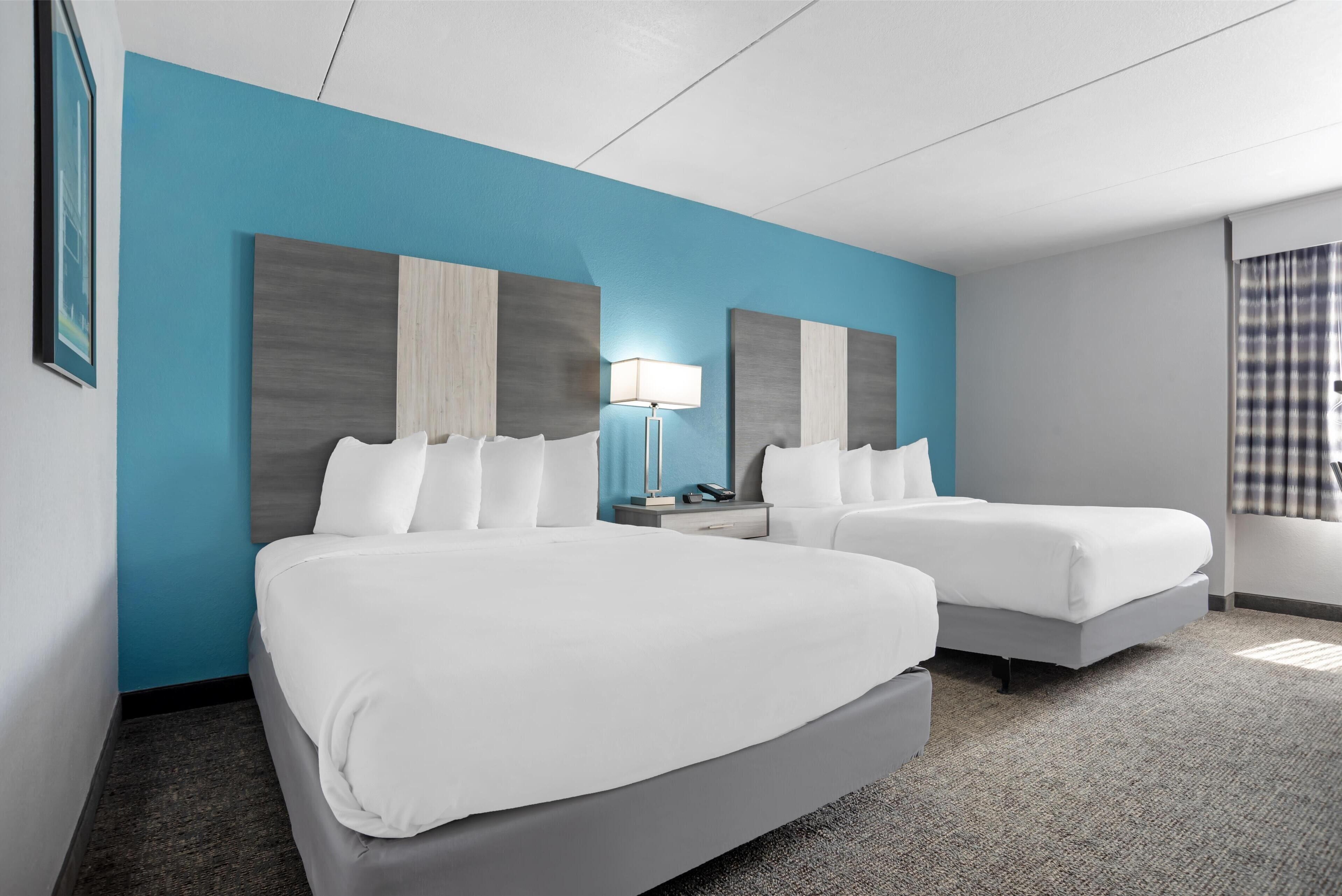 standard room, 2 queen beds, accessible, refrigerator & microwave (pet friendly) | 1 bedroom, pillow-top beds, individually decorated