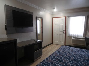 Room, 1 King Bed | Iron/ironing board, alarm clocks - Americas Best Value Inn Rialto (Rialto)
