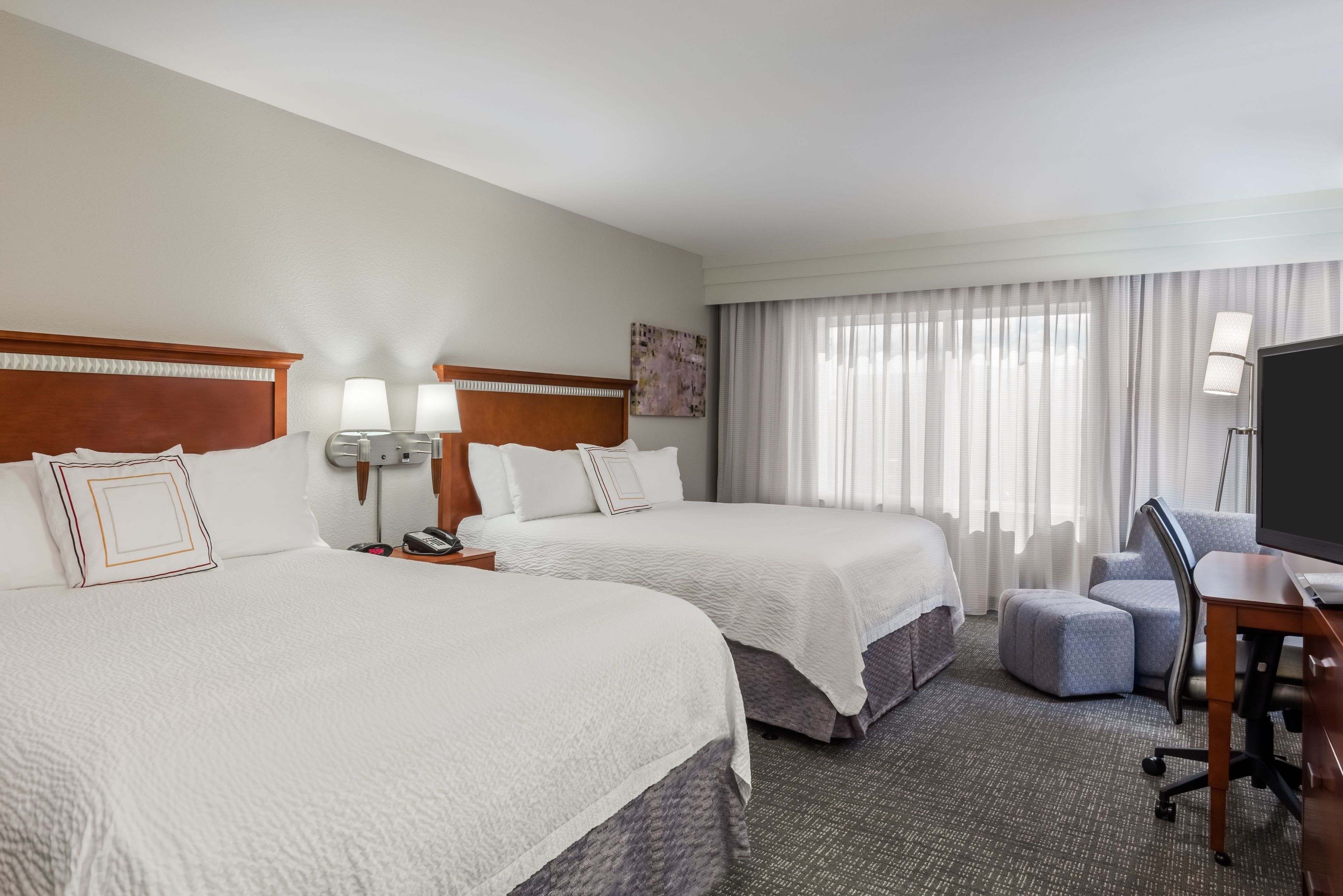 desk, blackout curtains, iron/ironing board, free cots/infant beds