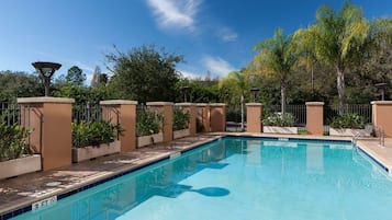 Outdoor pool, open 9:00 AM to 10:00 PM, sun loungers