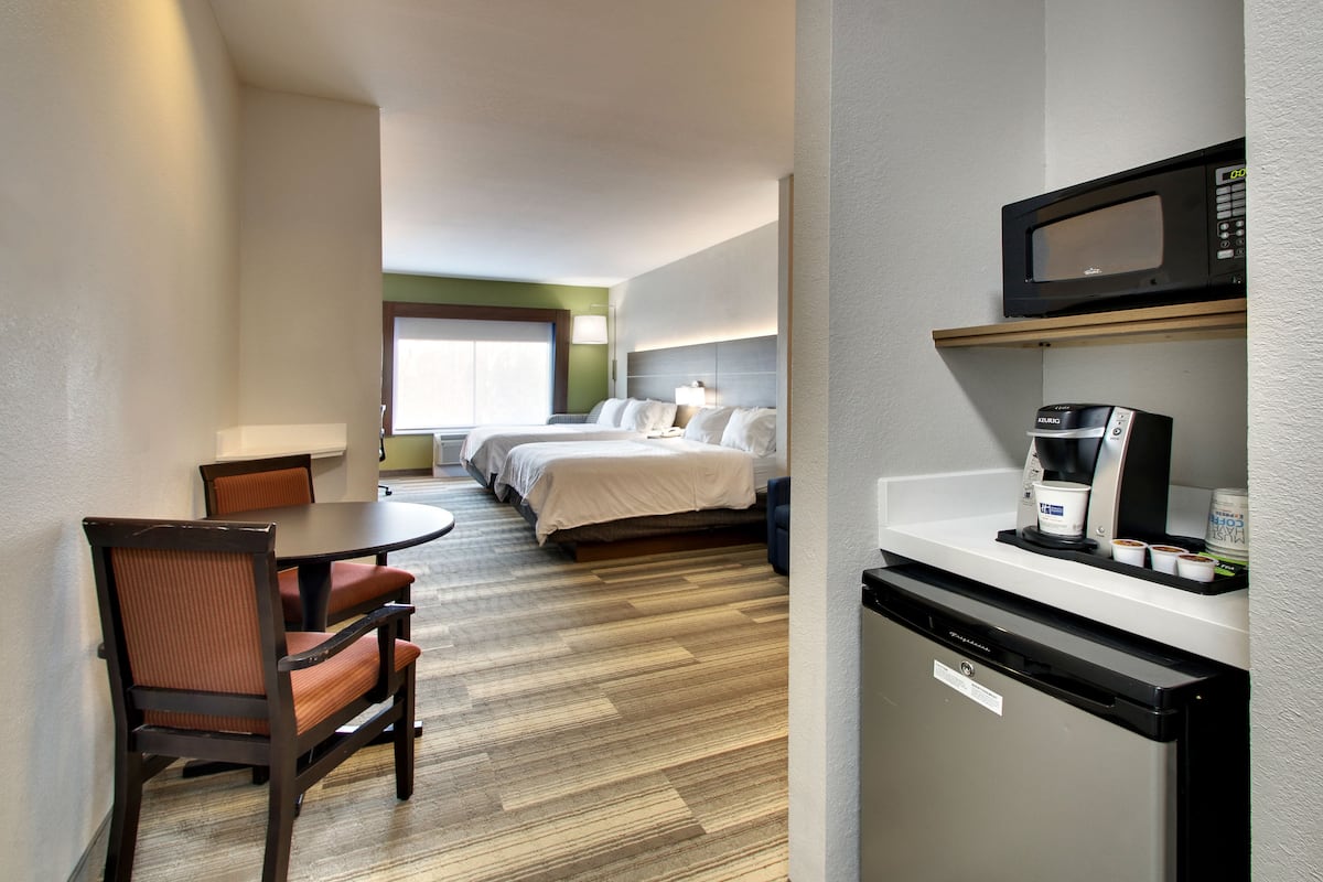 Suite, 2 Queen Beds | In-room safe, desk, iron/ironing board, free cribs/infant beds