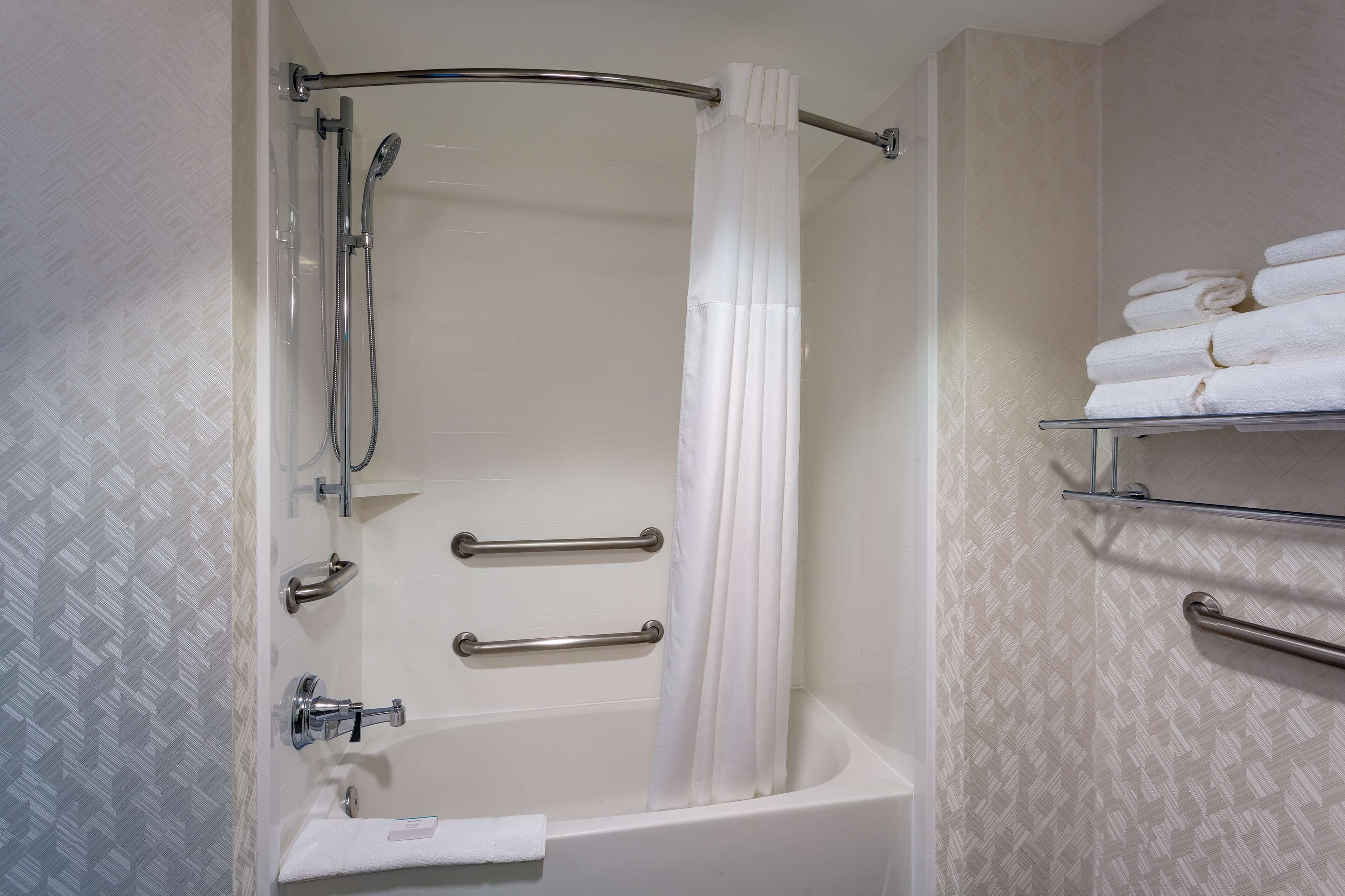 combined shower/bathtub, free toiletries, hair dryer, towels
