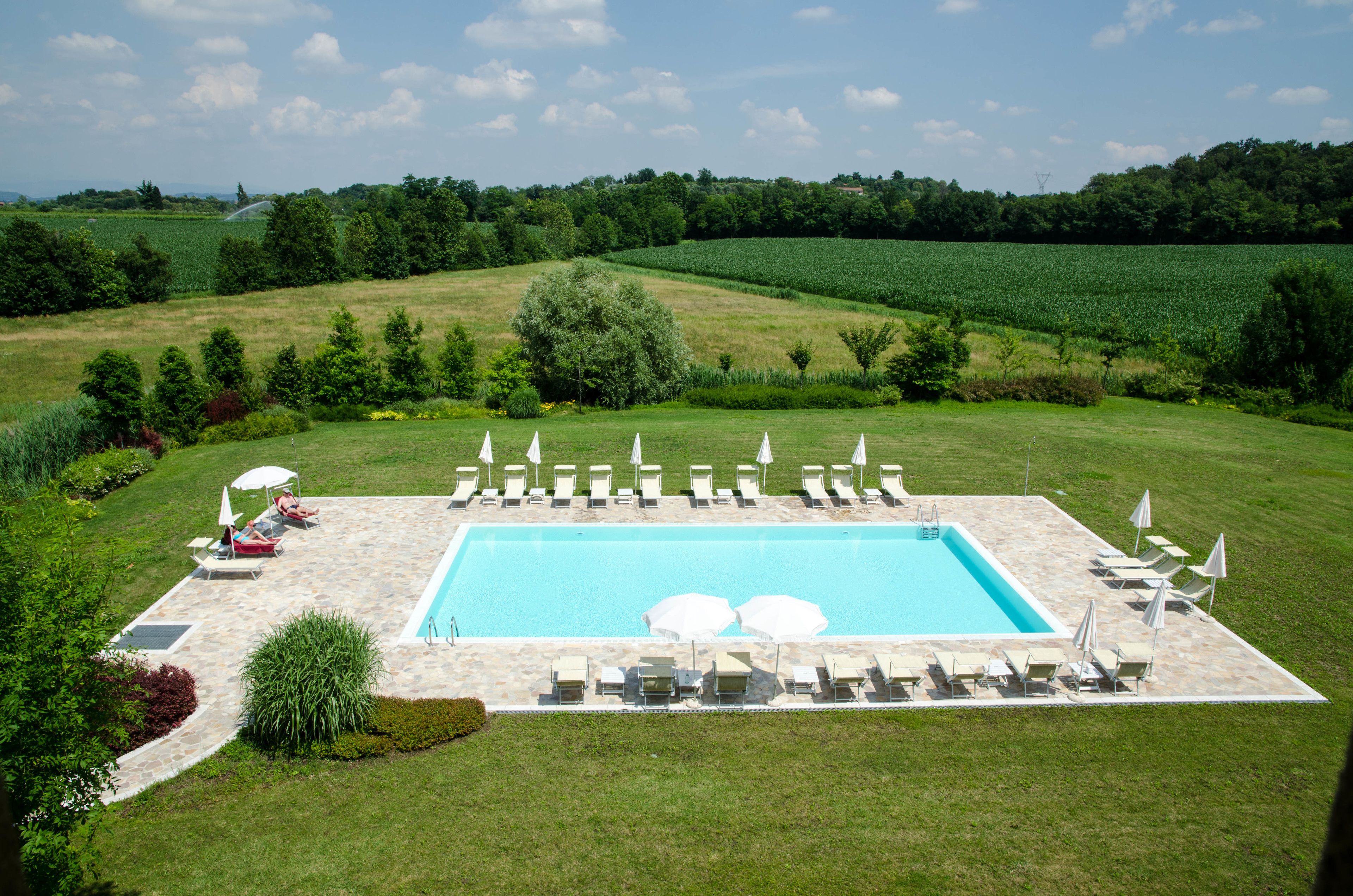 Seasonal outdoor pool, pool umbrellas, sun loungers