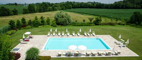 Seasonal outdoor pool, pool umbrellas, pool loungers