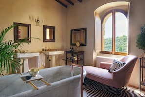 Premium bedding, down comforters, free minibar items, in-room safe