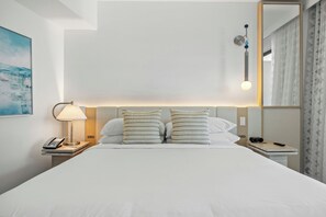 Roba de llit d'alta qualitat, cobrellits i caixa forta a l'habitació 