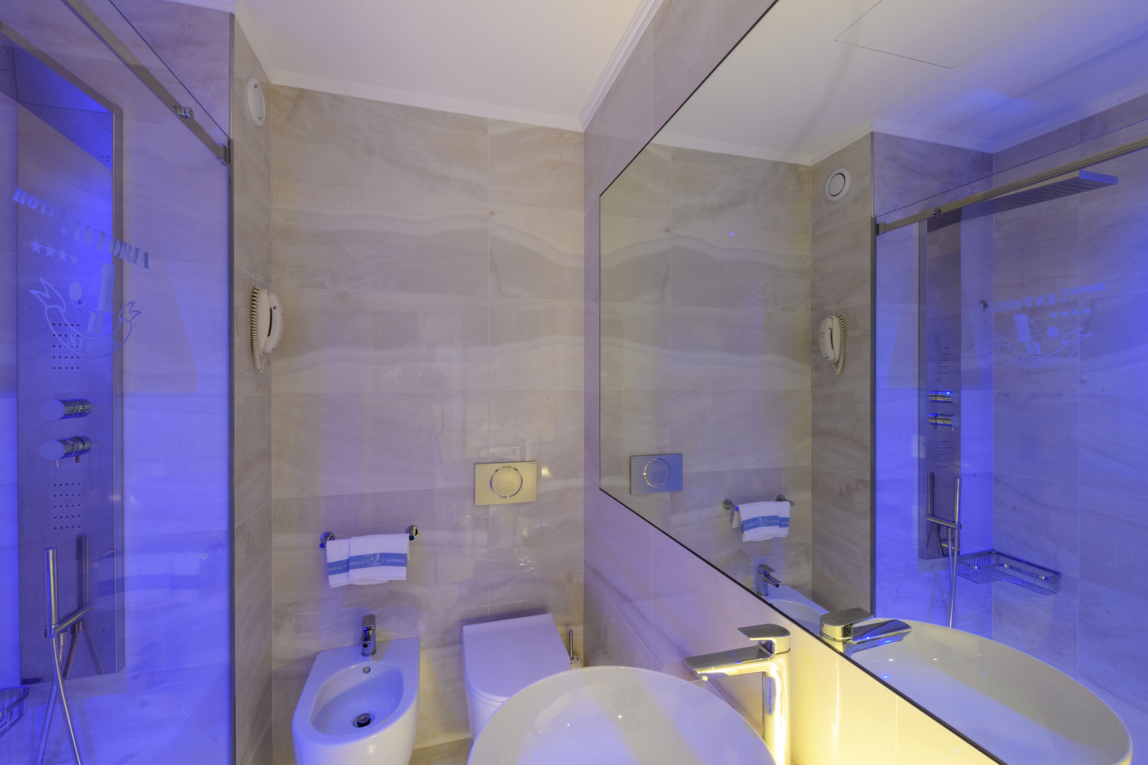 combined shower/bathtub, free toiletries, hair dryer, slippers