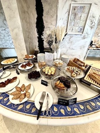 Daily buffet breakfast (EUR 15 per person)