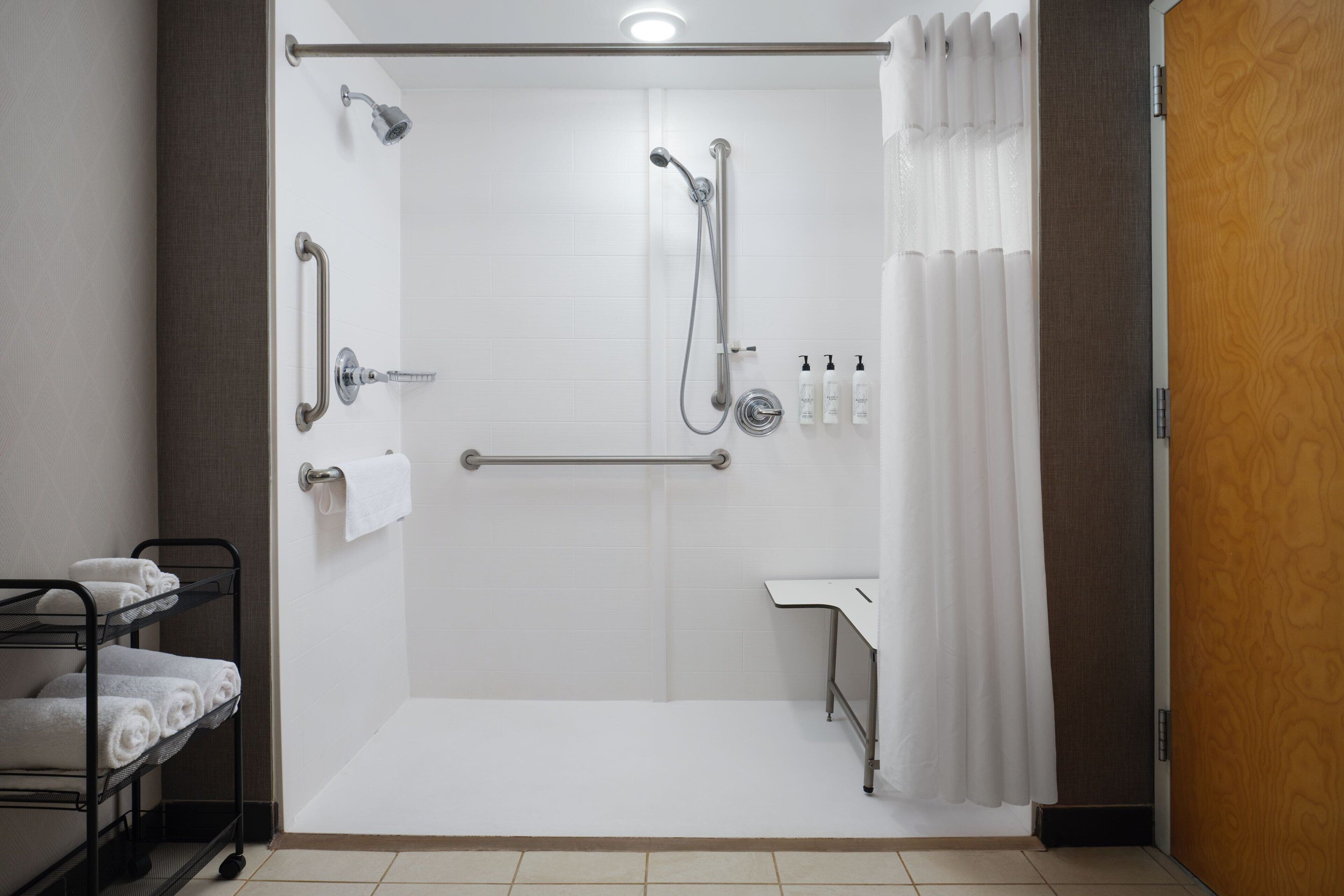 studio suite, multiple beds, non smoking | bathroom | combined shower/bathtub, designer toiletries, hair dryer, towels