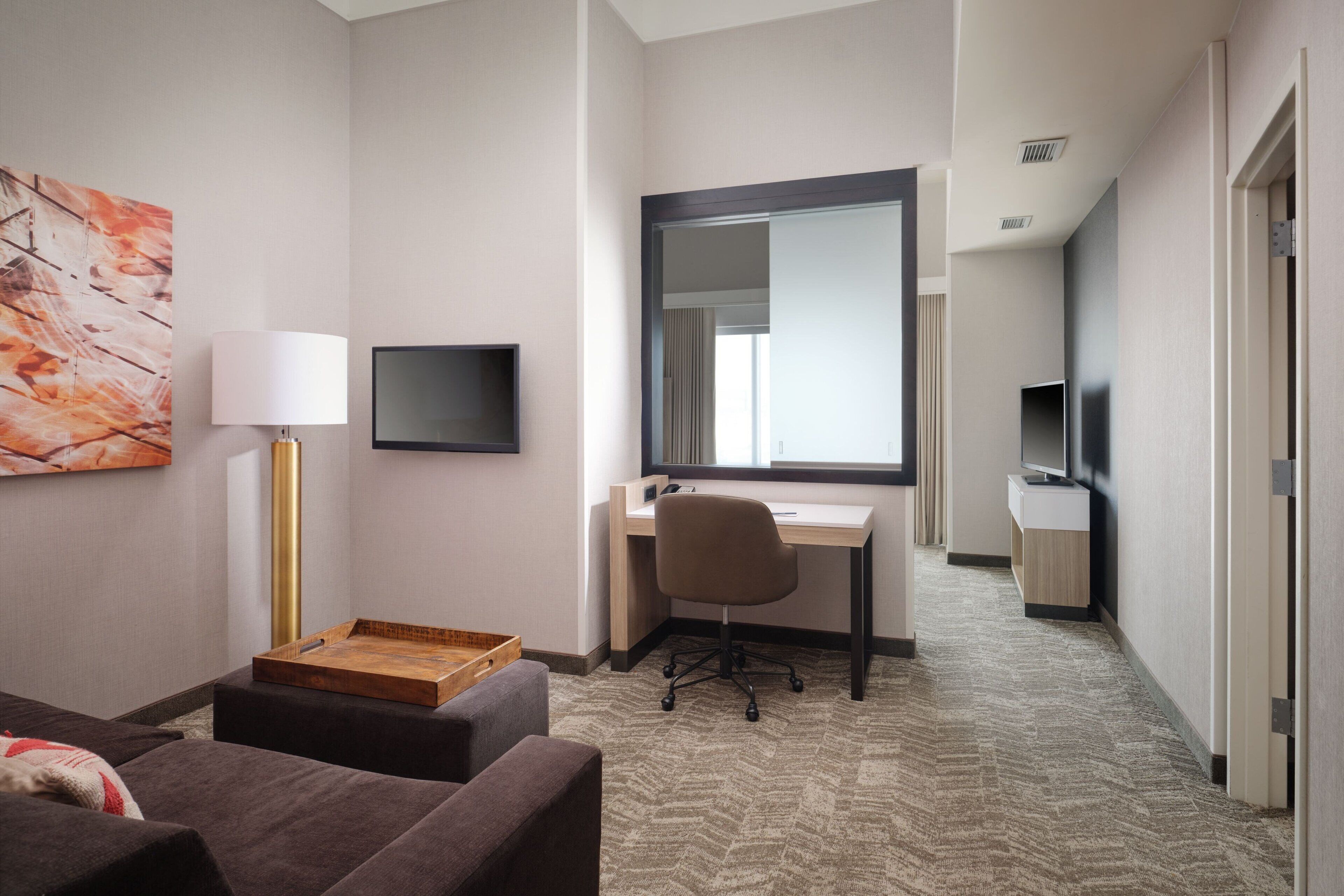 suite, multiple beds | living area | lcd tv