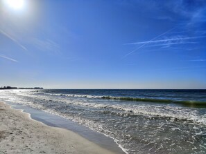 A la platja, caiac i pesca