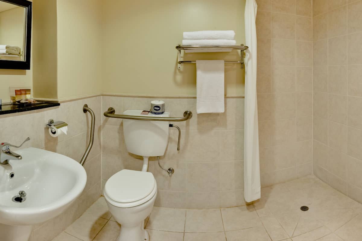 separate bathtub and shower, free toiletries, hair dryer, towels