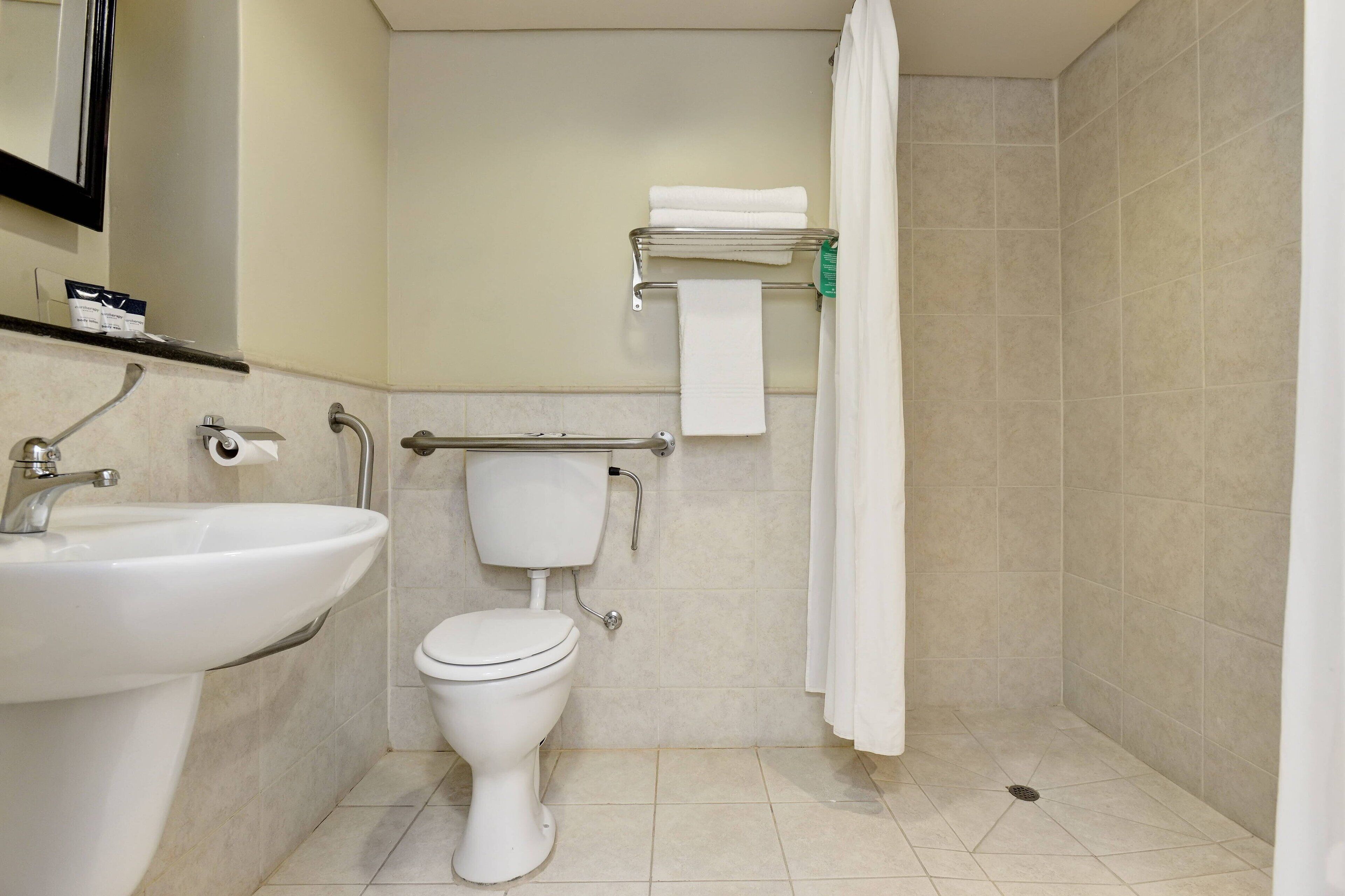 separate bathtub and shower, free toiletries, hair dryer, towels