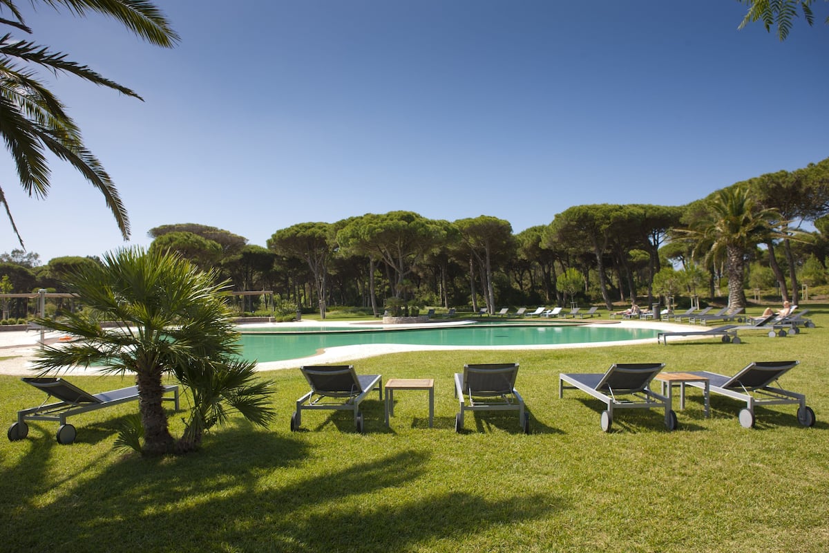 seasonal outdoor pool, pool umbrellas, pool loungers