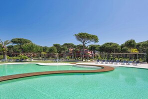 Seasonal outdoor pool, pool umbrellas, pool loungers