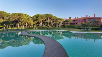 Seasonal outdoor pool, pool umbrellas, pool loungers