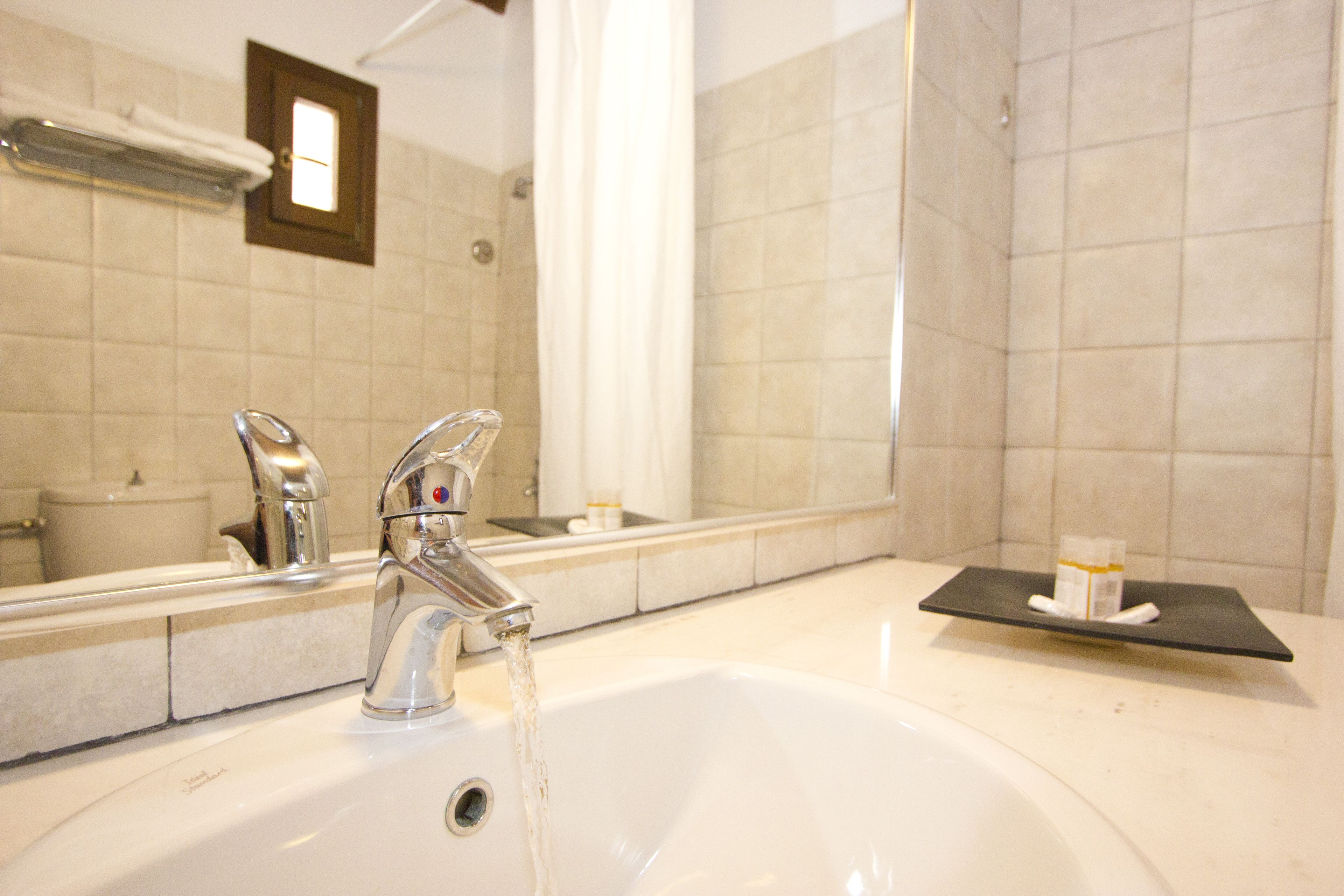 economy double room | premium bedding, in-room safe, desk, iron/ironing board