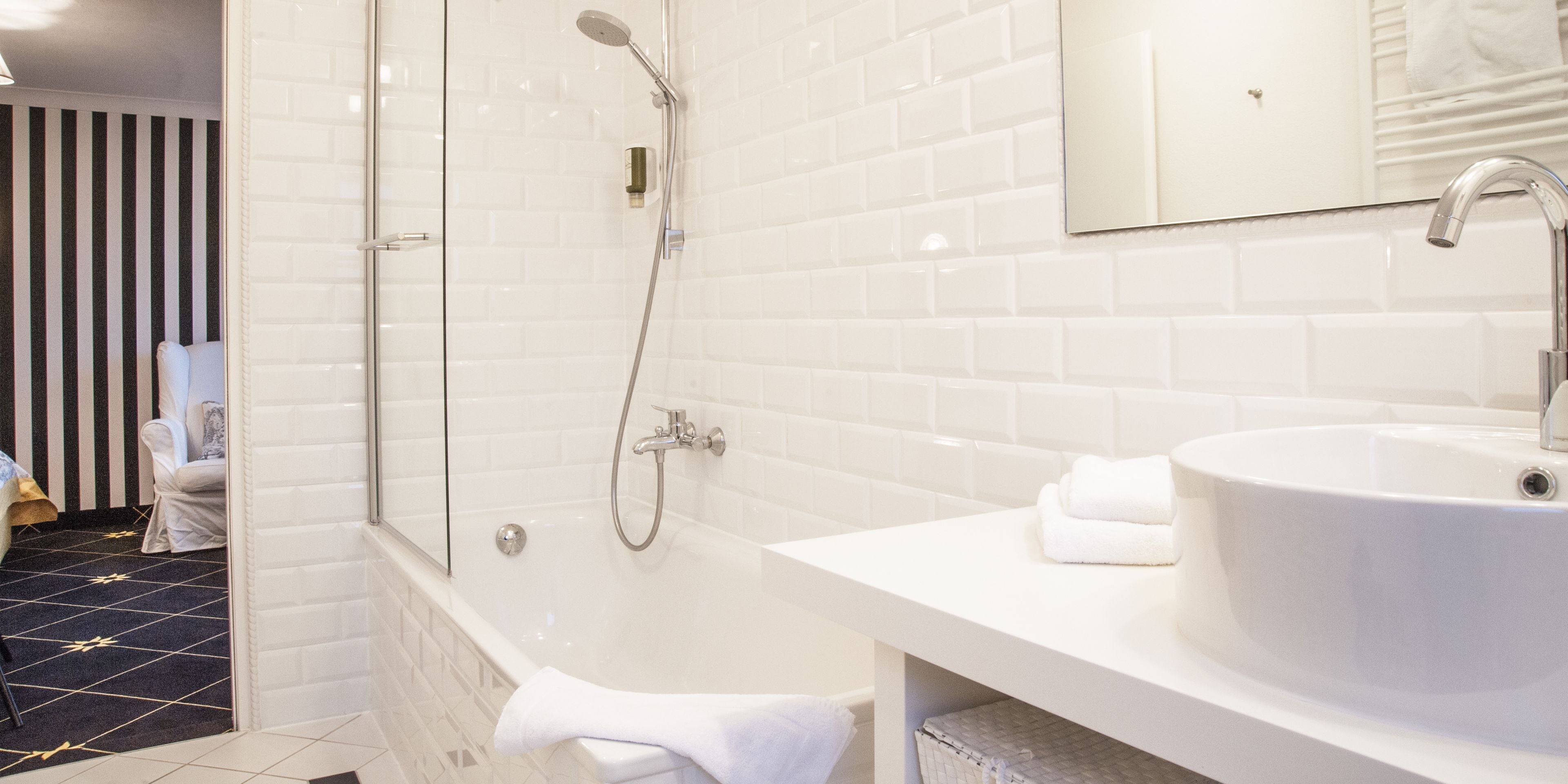 comfort double room, 1 king bed | bathroom | hair dryer, bathrobes, towels