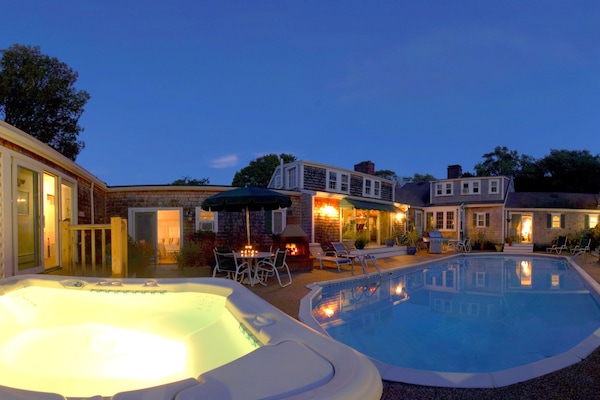 Seasonal outdoor pool, open 8:00 AM to 10:00 PM, pool umbrellas