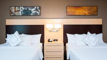 Premium bedding, desk, iron/ironing board, free cots/infant beds