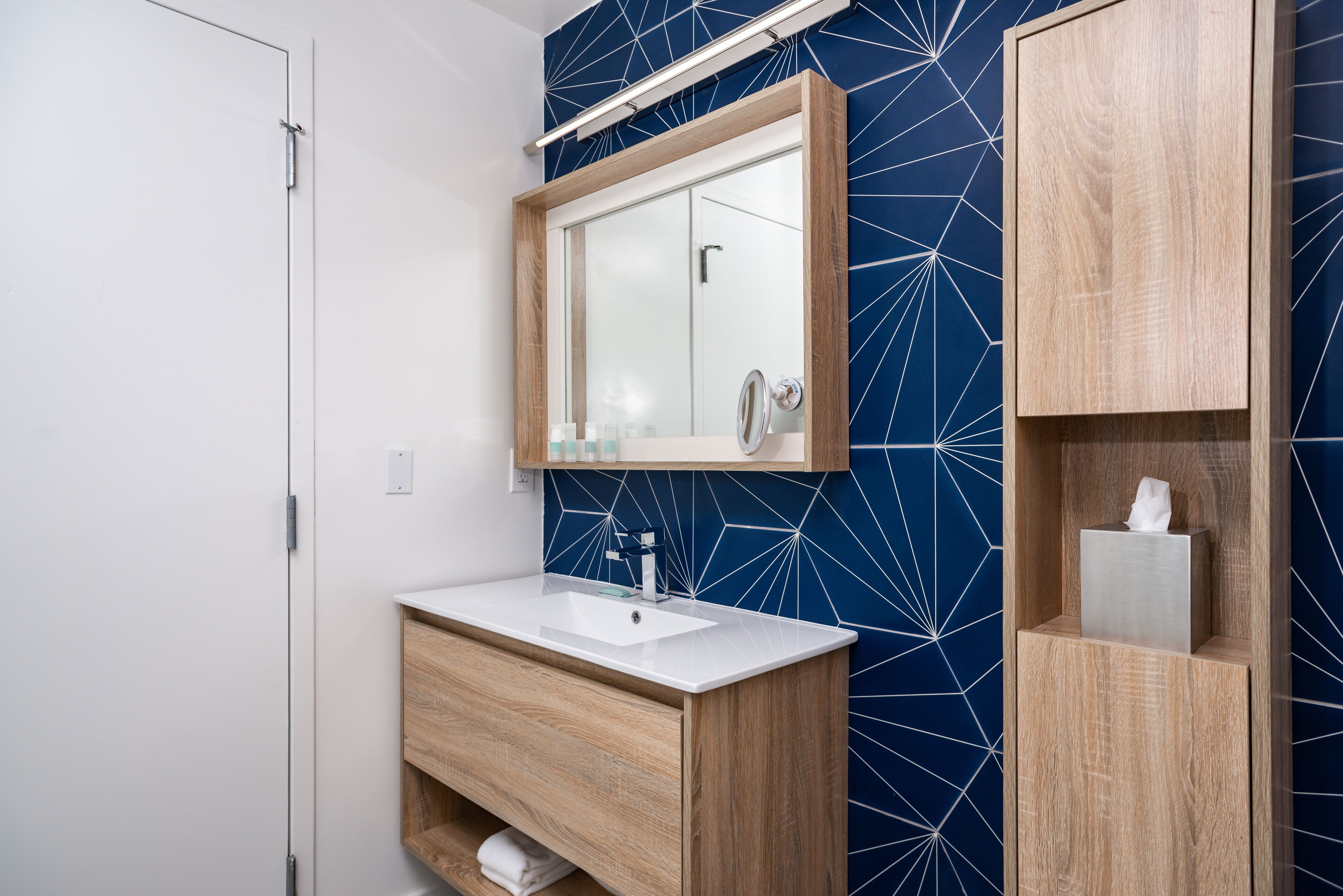 luxury room, 2 queen beds | bathroom | shower, designer toiletries, hair dryer, towels