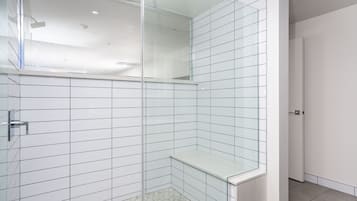 Luxury Studio Suite | Bathroom | Shower, designer toiletries, hair dryer, towels