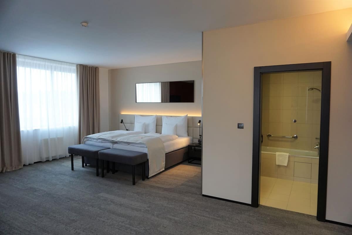 Hypo-allergenic bedding, in-room safe, desk, laptop workspace