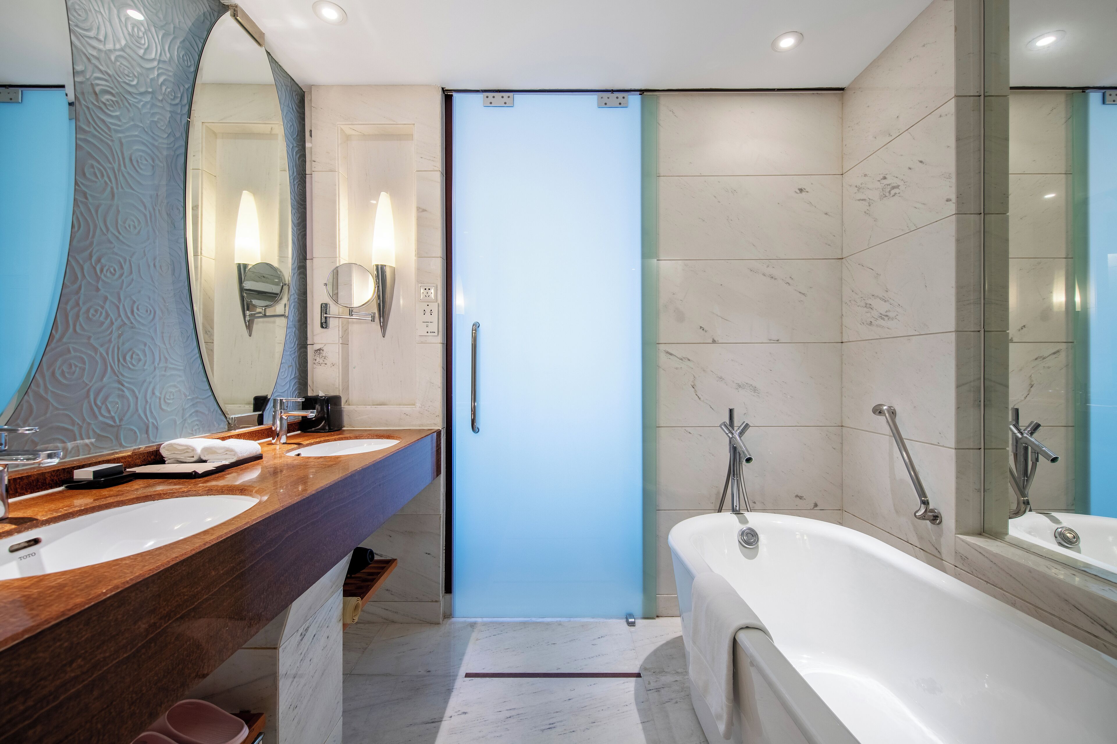 separate bathtub and shower, deep-soaking bathtub, rainfall showerhead