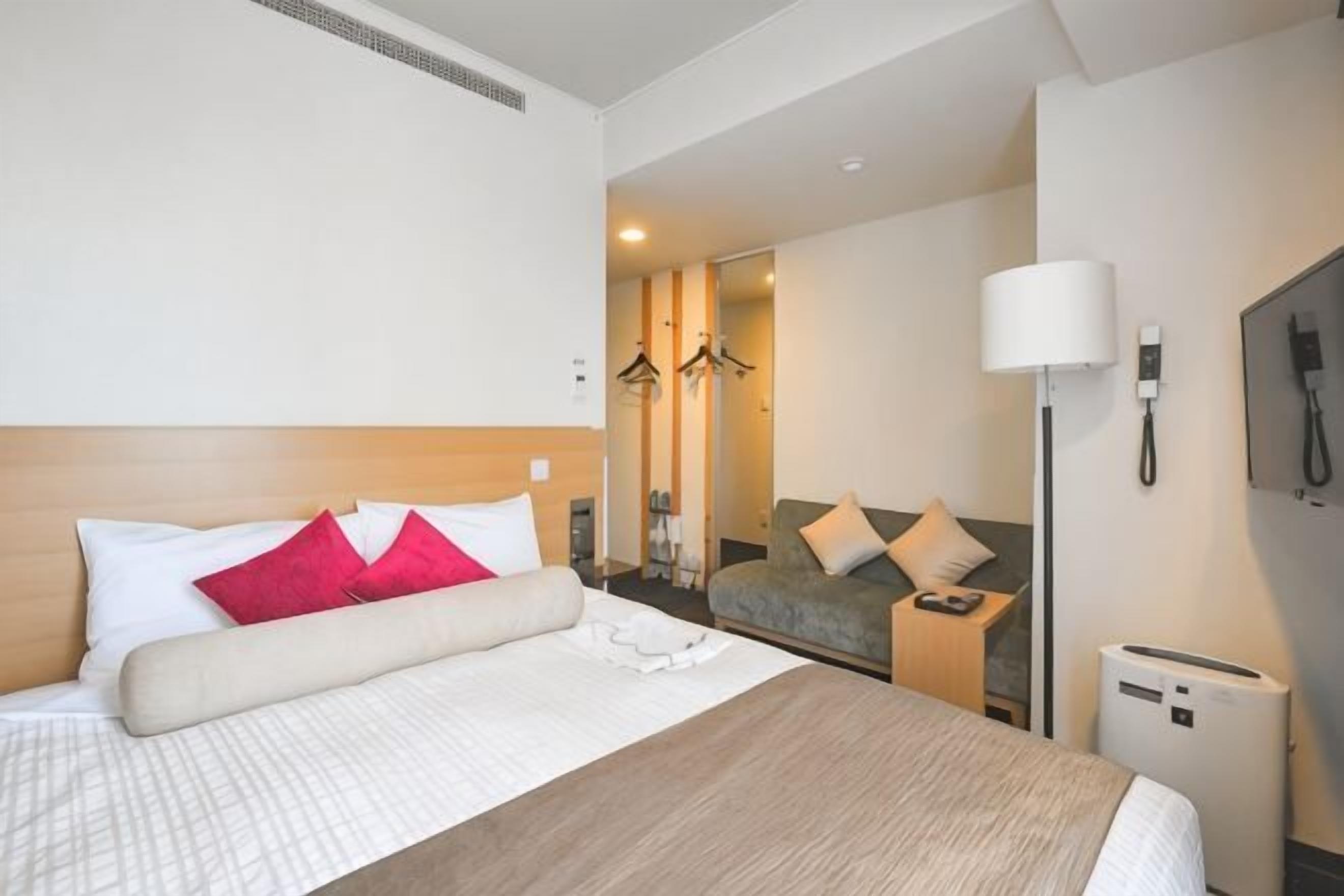 Down comforters, memory foam beds, blackout drapes, free WiFi