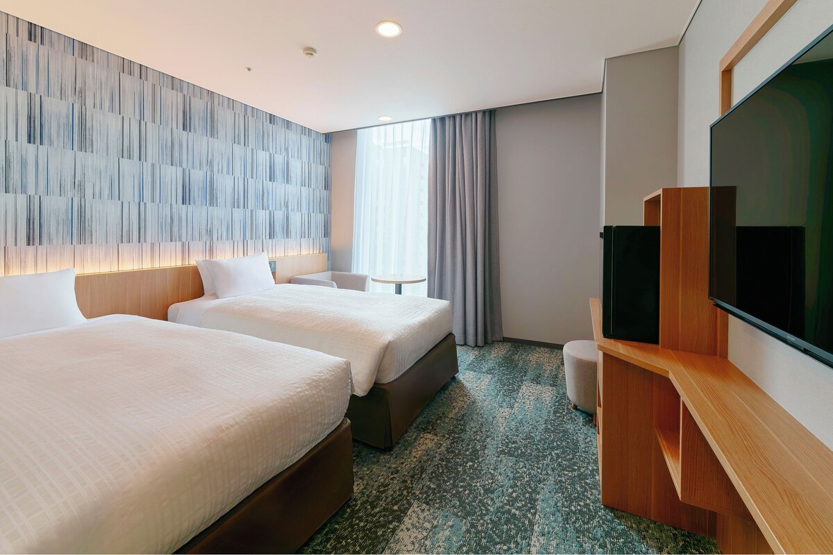 Standard Twin Room, Non Smoking | Down comforters, memory foam beds, blackout drapes, WiFi (free)