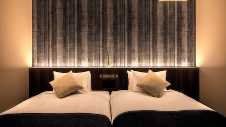 Standard Twin Room, Non Smoking | Down comforters, memory foam beds, blackout drapes, free WiFi