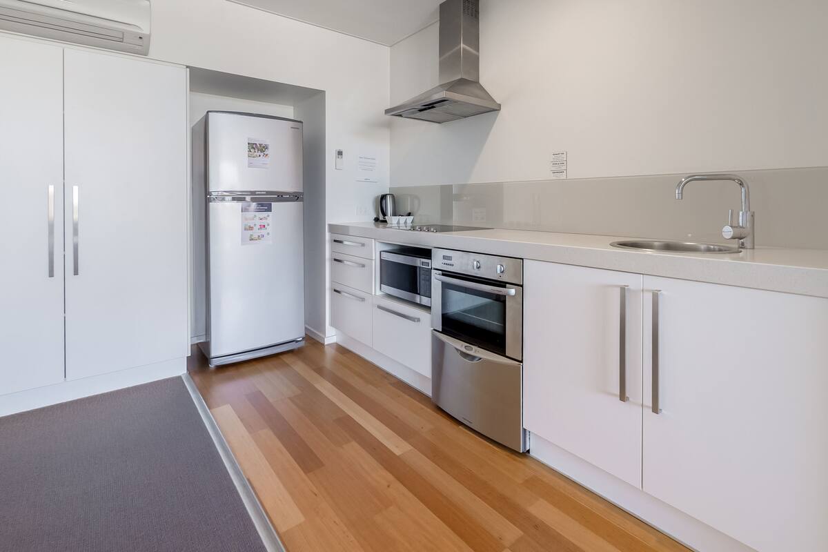 fridge, microwave, electric kettle, dining tables