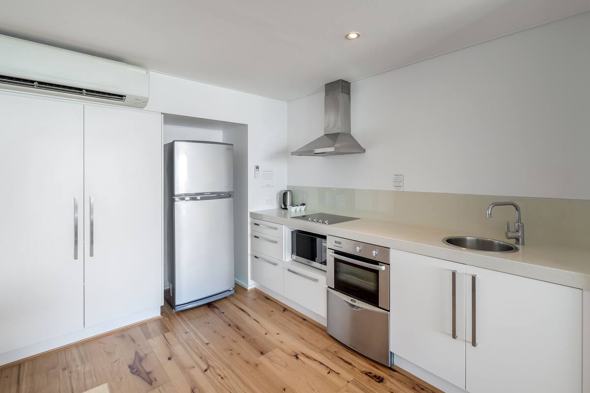 fridge, microwave, electric kettle, dining tables