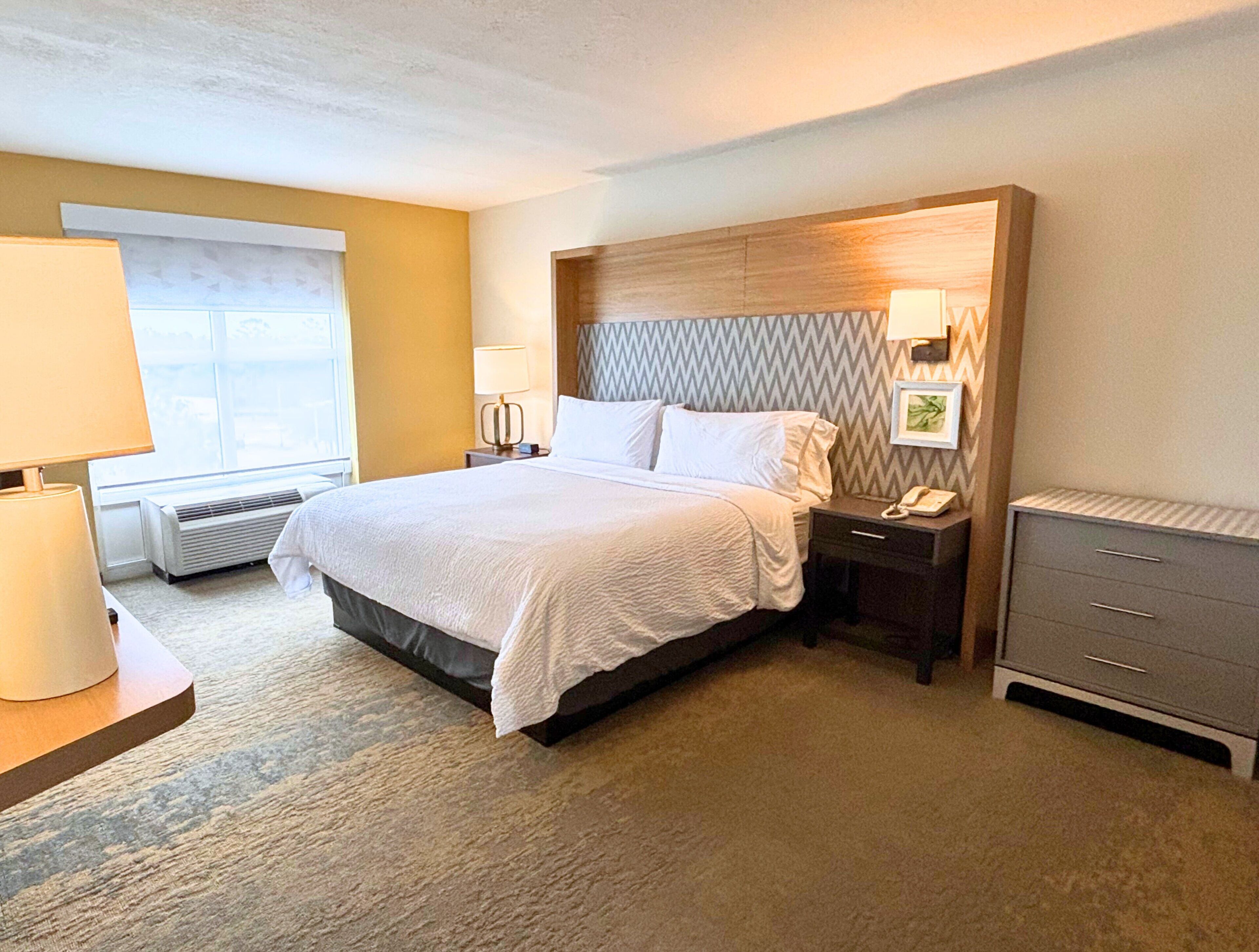 suite, 1 king bed | desk, iron/ironing board, free cots/infant beds, rollaway beds