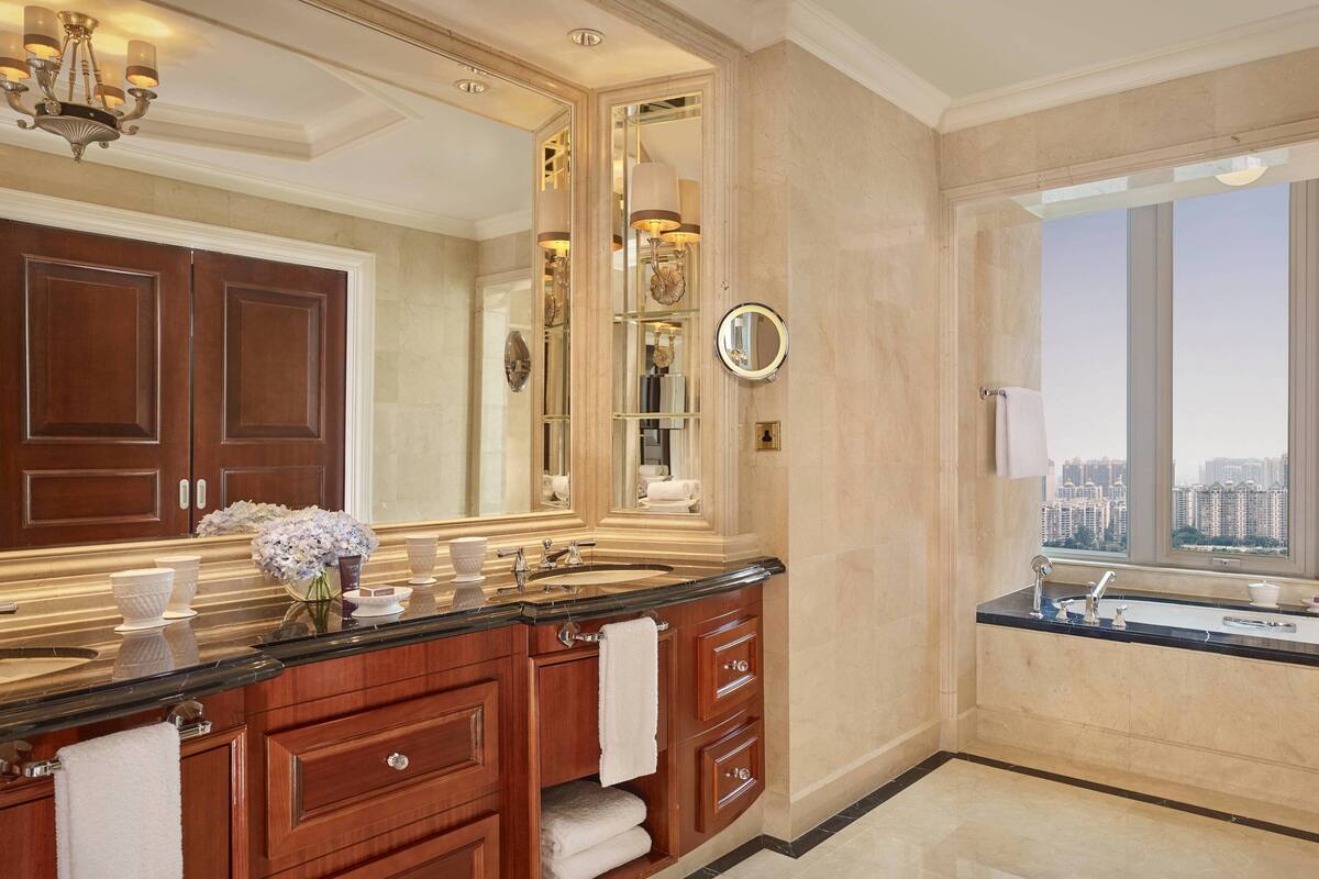 separate bathtub and shower, deep-soaking bathtub, rainfall showerhead