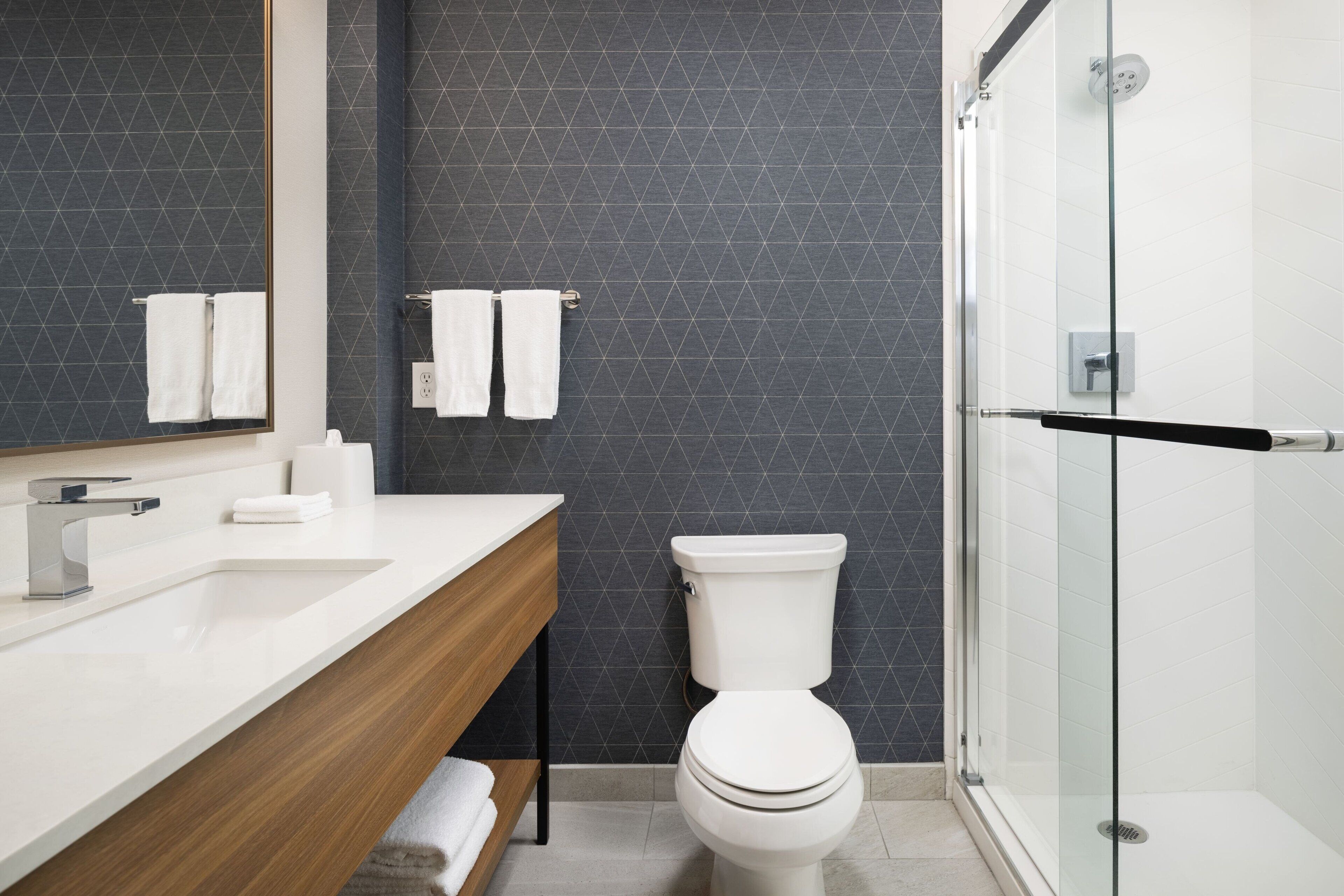 combined shower/bathtub, free toiletries, hair dryer, towels