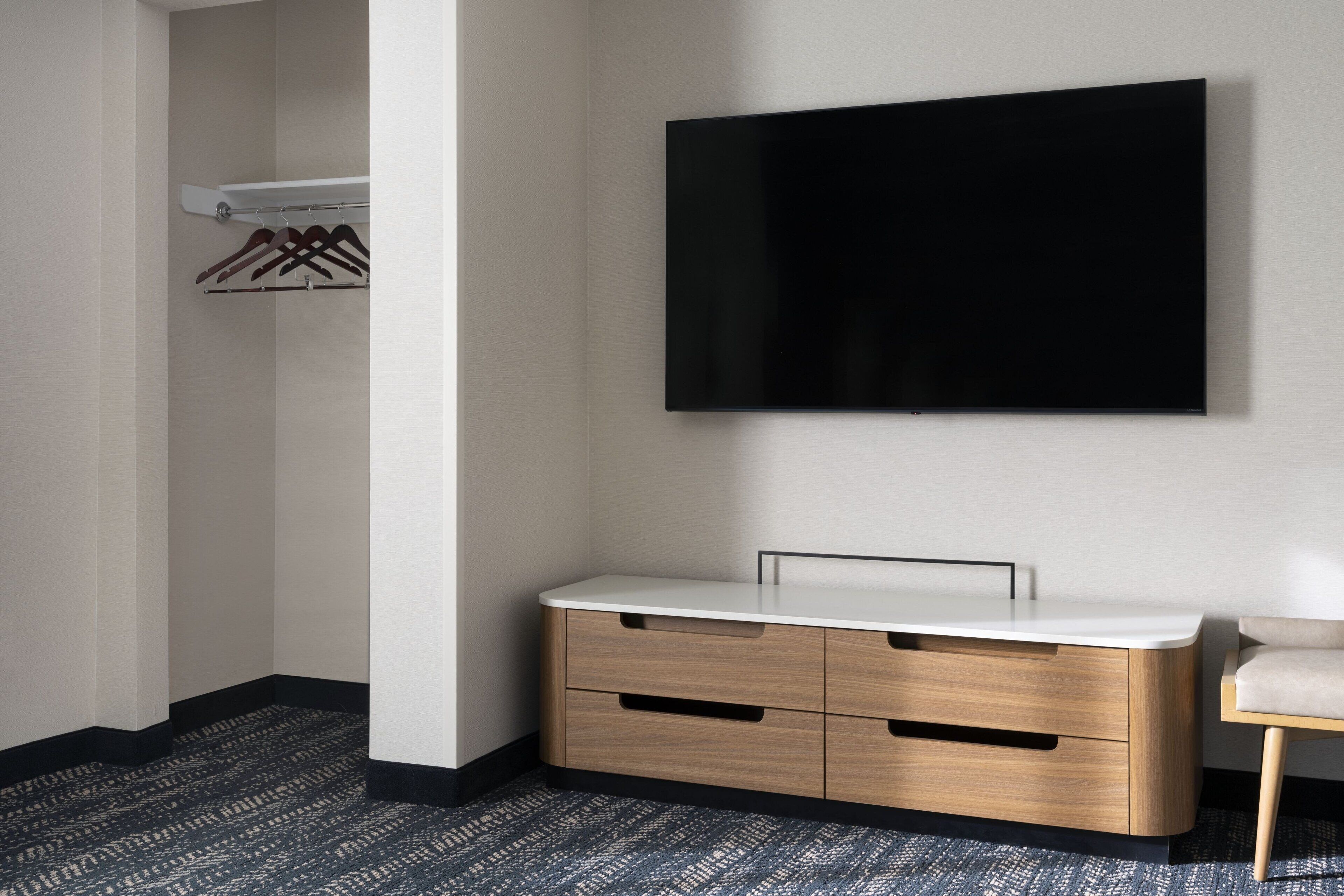 premium bedding, down duvets, desk, blackout curtains