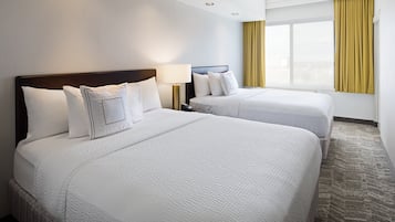 Down duvets, pillow-top beds, in-room safe, desk