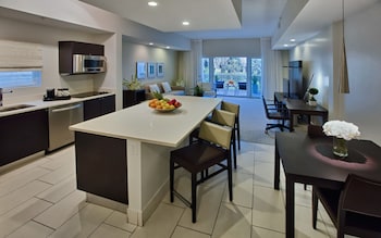 Full-size fridge, microwave, oven, stovetop at Provident Doral at the Blue Miami