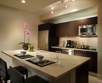 Full-size fridge, microwave, oven, stovetop at Provident Doral at the Blue Miami
