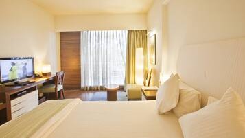 Phòng đơn Deluxe | Bộ đồ giường cao cấp, minibar, két bảo mật tại phòng, bàn