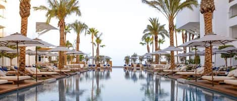 Outdoor pool, pool cabanas (surcharge), pool umbrellas